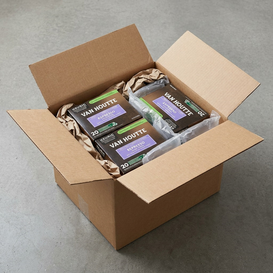 A close-up photograph shows the Van Houtte boxes cushioned with air pillows inside a sturdy shipping box.